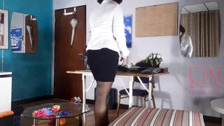 Naked lady boss in the office without panties. The bitch dresses in an office suit and plays with inflatable balls.