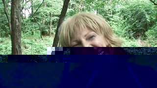 A sexy blonde woman gets her amazing natural boobs sprayed with cum