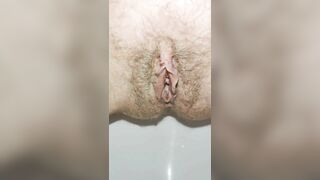 Hairy pussy pissing close up with toilet splashing
