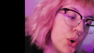 cute quiet girl smokes a hemp cigarette