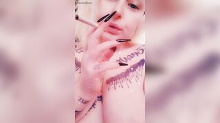 Blonde smokes naked