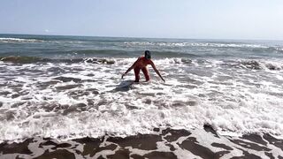 Dominant woman having fun on the beach