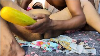 Brothers-in-law inserted a big cucumber inti bhabhi's pussy and fucked her.