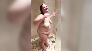 Irish Girl feeling good after a night out in Ireland taking shower at air bnb
