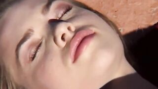 Petite teen masturbates outdoors