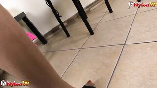 Hot black girl gives footjob to a dildo